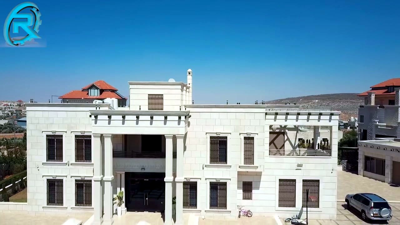 Completed natural stone villa façade
